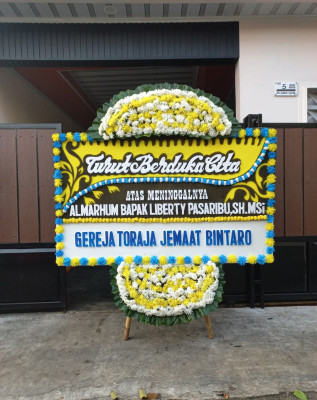 Papan Bunga Duka di Trikora